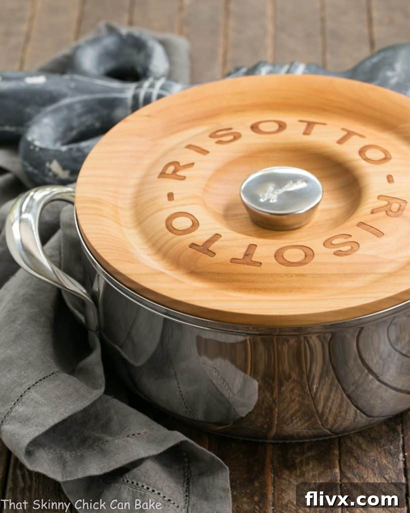 A close-up view of Bacon Mushroom Risotto with Caramelized Onions, showcasing the tender rice grains, crispy bacon bits, sliced mushrooms, and golden caramelized onions. A truly rich and gourmet side dish.