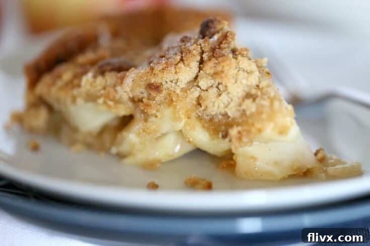 Classic Dutch Apple Pie with a crumbly streusel topping, baked to golden perfection.