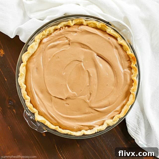A rich and easy Mom's Easy Chocolate Pie, with a perfectly set chocolate filling and a flaky crust.