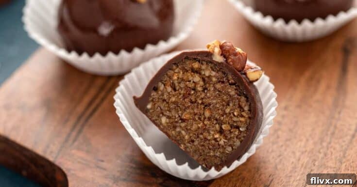 Rich and chewy Pecan Pie Truffles coated in chocolate, featuring a creamy bourbon pecan pie filling.