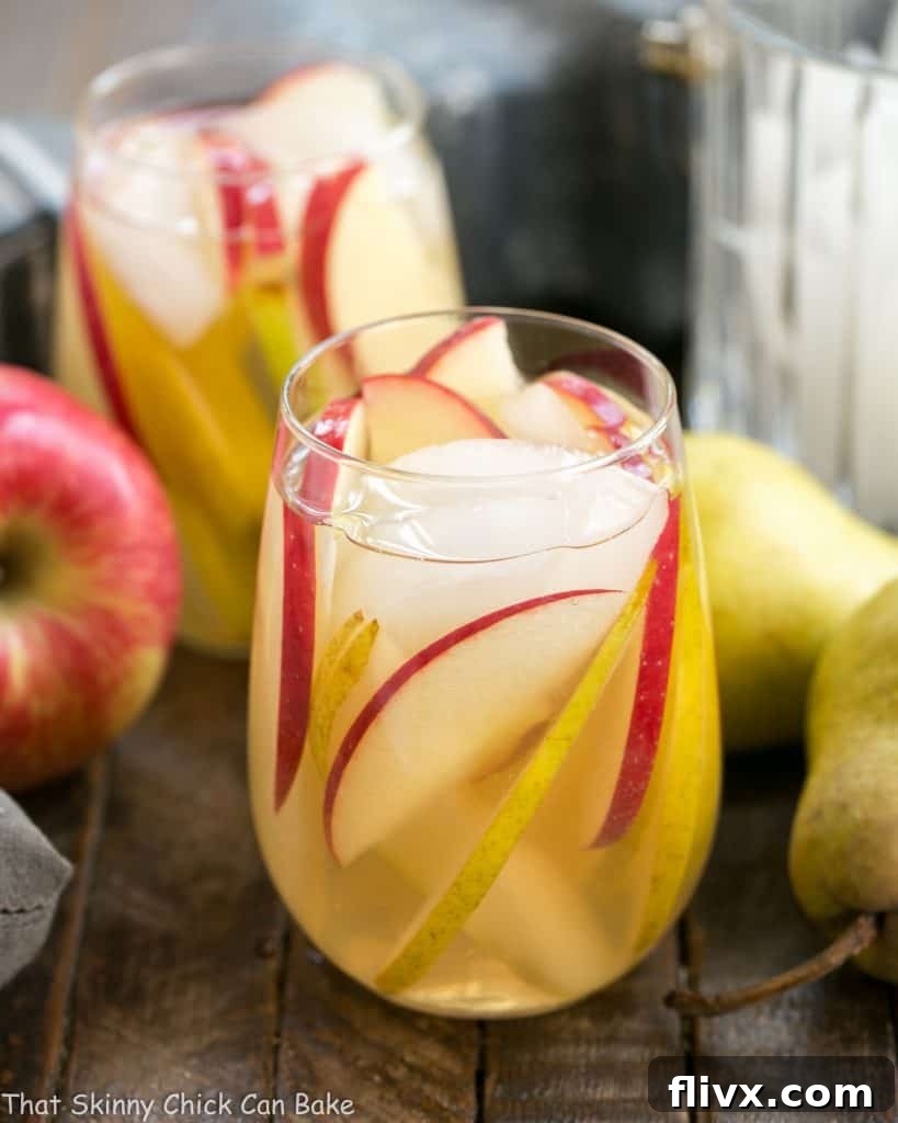 Two glasses of Apple Cider Sangria, elegantly presented and ready to serve.