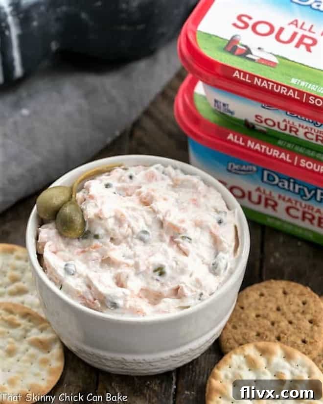 Holiday party dip made with smoked salmon and capers, garnished and ready to serve.
