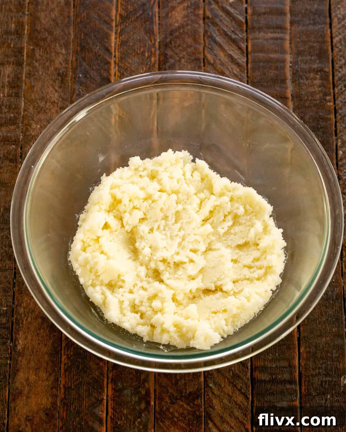 Step 2: Butter and sugar being creamed together in a mixing bowl.