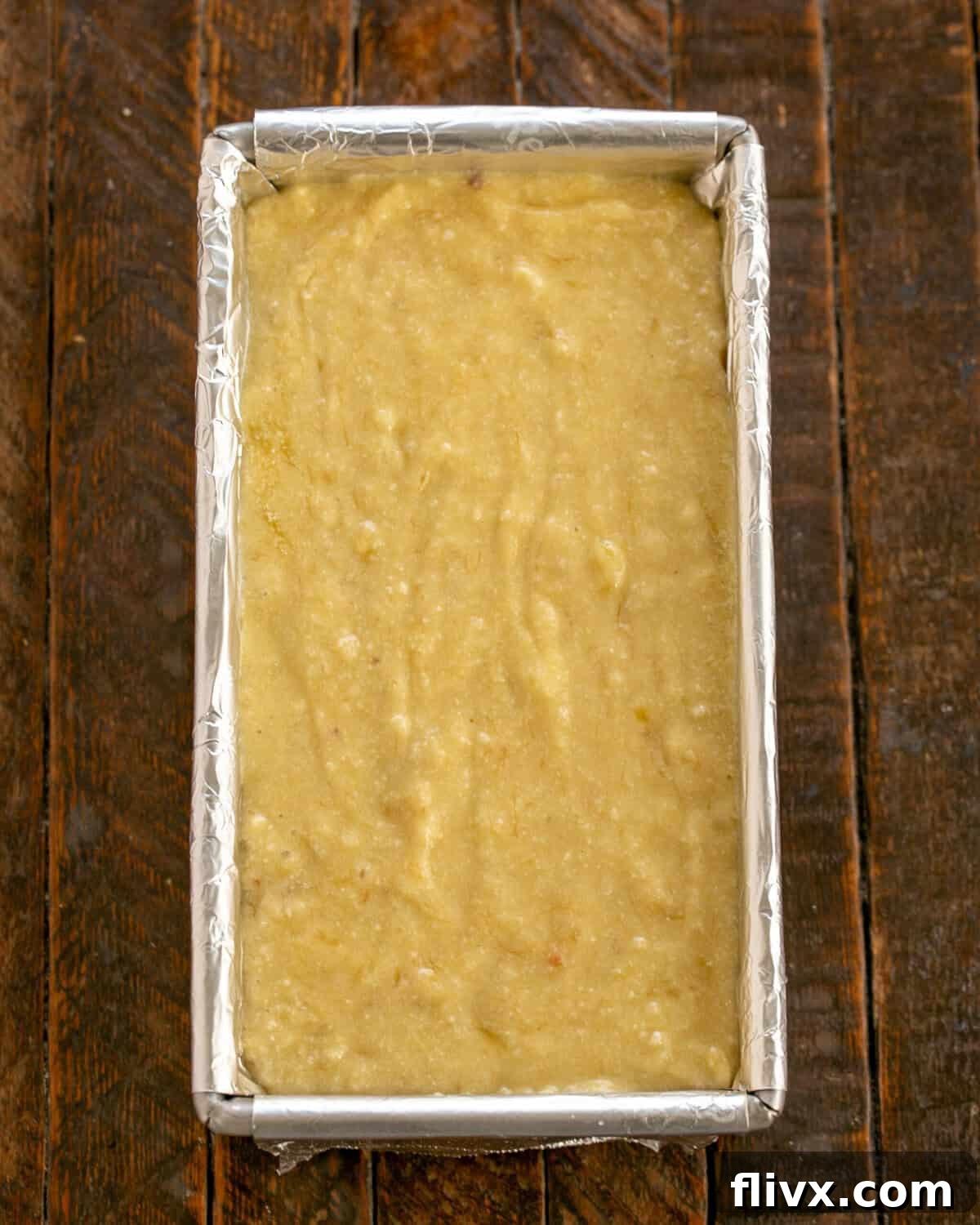 Step 5: Dry ingredients gently folded into the wet banana mixture.