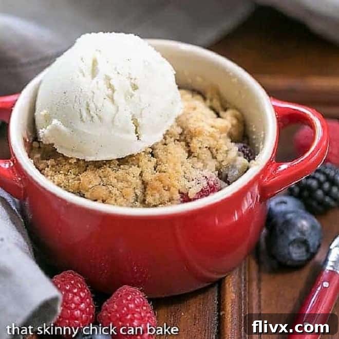Delicious Individual Berry Crisps with a golden brown streusel topping, showcasing mixed berries