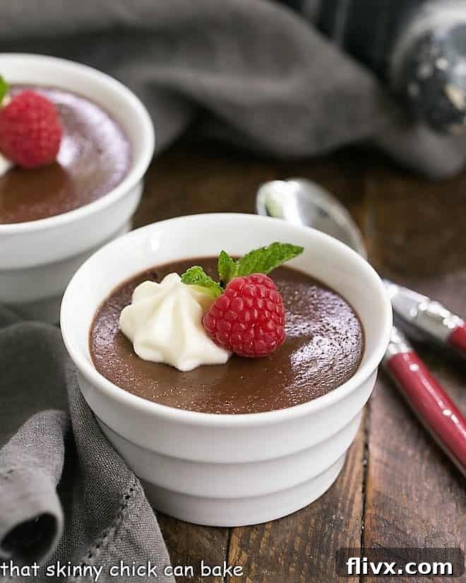Baked Chocolate Pots de Crème with White Chocolate Whipped Cream in white ramekins