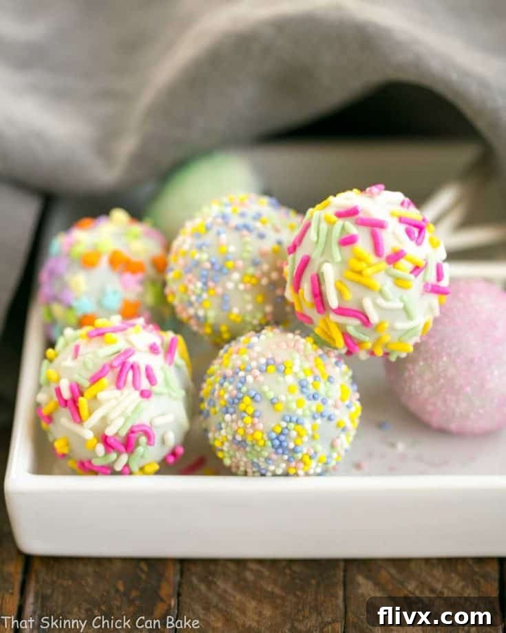 Easter Cake Pops resting on a square plate