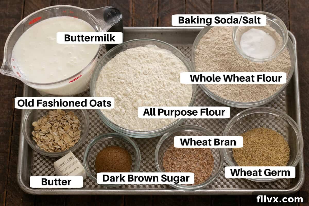 All the essential ingredients for making Irish Brown Bread laid out neatly on a baking sheet, complete with labels for clarity.