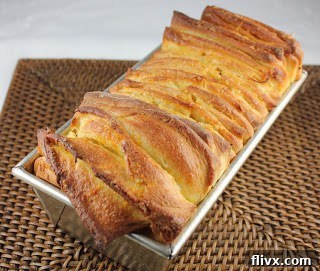 Orange Pull apart bread in a loaf pan