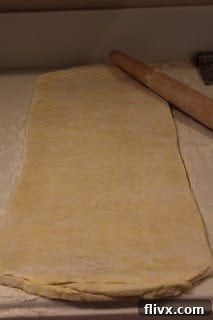 Puff pastry on the counter after the second turn