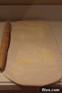 Step two of rolling out homemade puff pastry