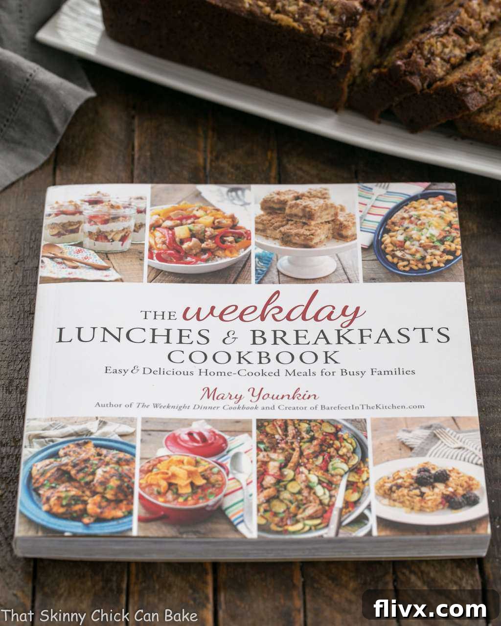 Chocolate Chip Toffee Banana Bread loaf alongside 'The Weekday Lunches & Breakfasts Cookbook' by Mary Younkin.