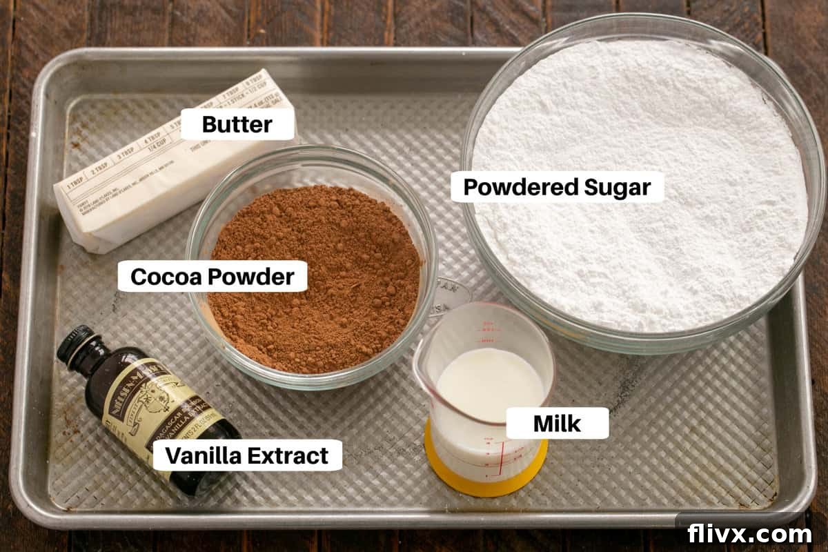 Black Magic Cake Frosting Ingredients on a sheet pan with labels.