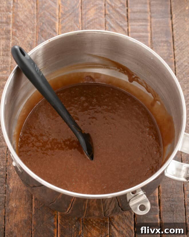 Dry and liquid ingredients blended in mixing bowl.