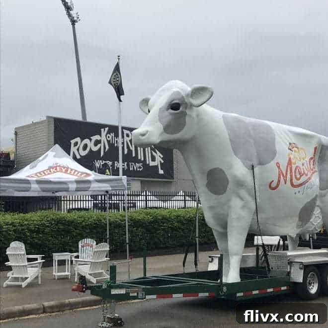 Turkey Hill's Good Mooed Sampling Tour featuring a giant cow mascot, inviting people to sample delicious all-natural ice cream.
