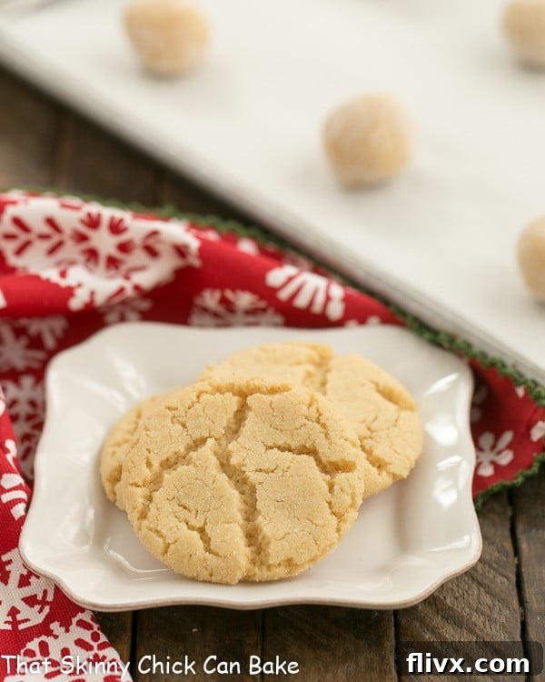 A plate piled high with golden-brown chewy butterscotch cookies, tempting and delicious.