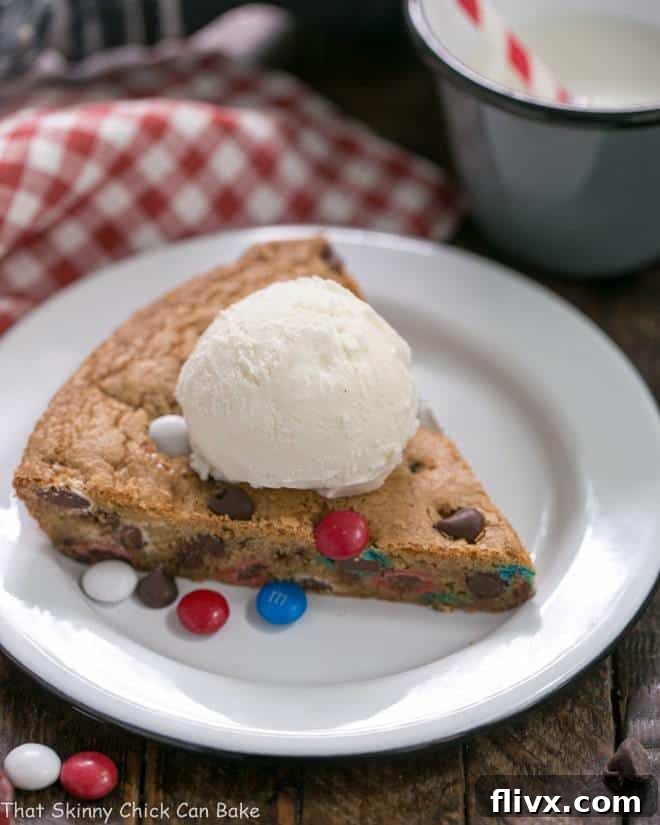 Patriotic Skillet Cake with melted chocolate chips and M&M's.