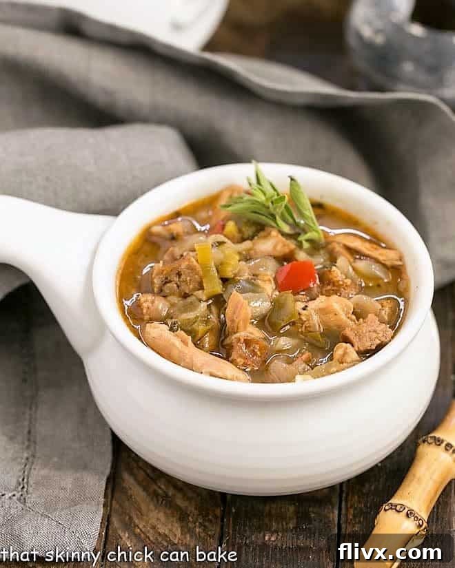 Sausage and Chicken Gumbo in a rustic ceramic soup bowl, ready to be served