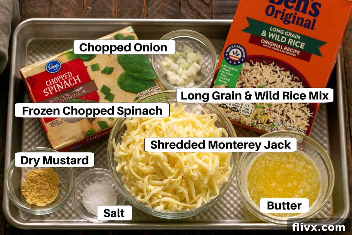 Various ingredients for rice casserole laid out on a sheet pan with descriptive labels.