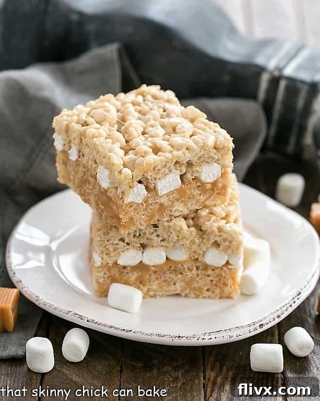 Caramel Stuffed Rice Krispie Treats on a round dessert plate