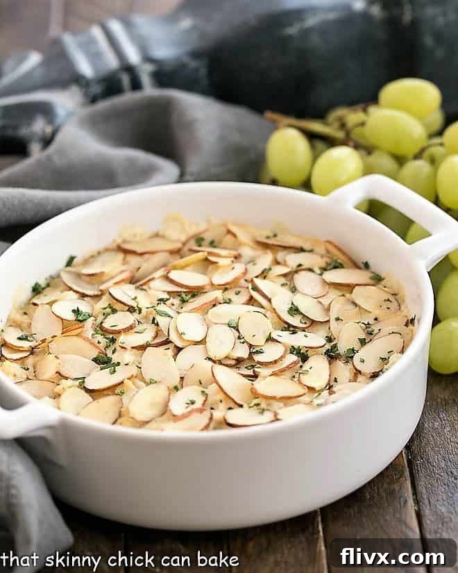 Parmesan Crab Dip in a white casserole dish