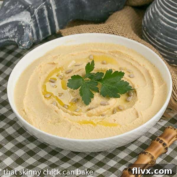 Hummus: A delightful image of Classic Hummus, infused with the fresh flavors of lemon and garlic.
