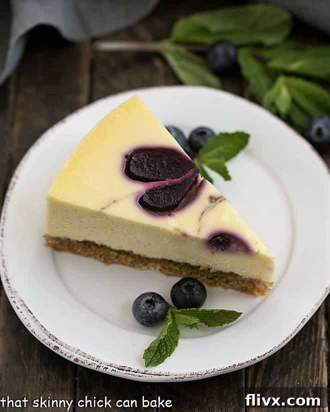 Lush Blueberry Swirl Cheesecake, freshly baked and ready to be served