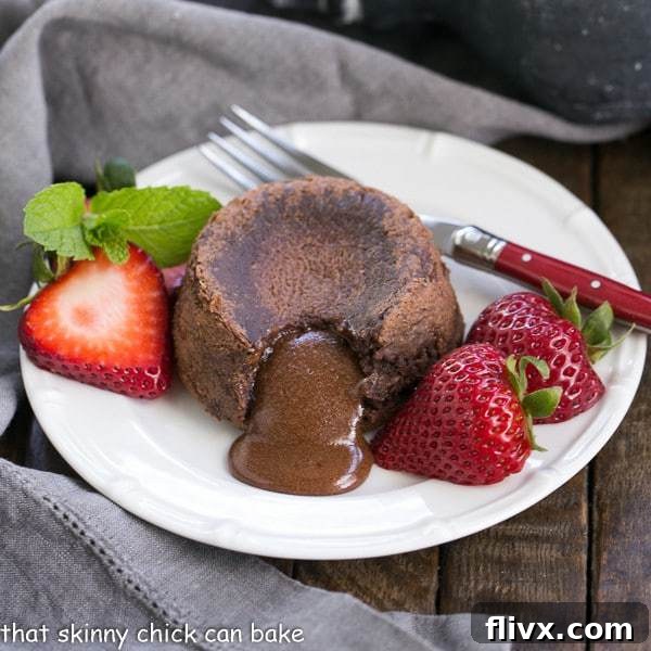 A perfectly baked molten lava cake with a rich, dark chocolate interior, ready for serving.