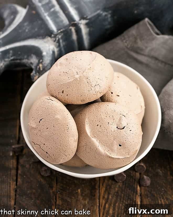 A bowl brimming with fluffy, perfectly baked Chocolate Egg White Cookies, ready to be enjoyed.