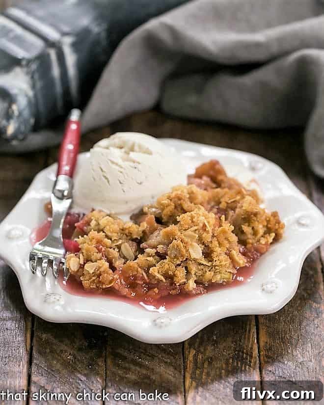A serving of Easy Rhubarb Crisp on a white octagonal plate.