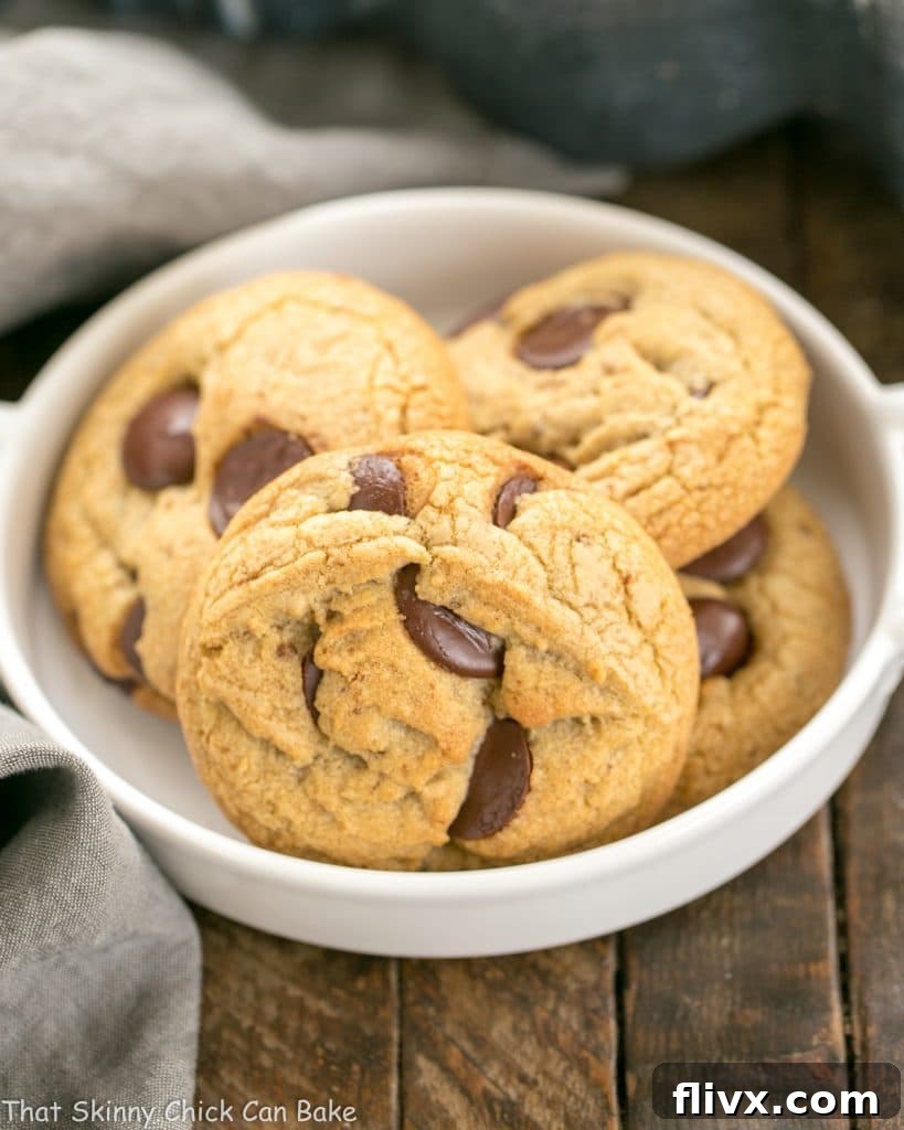 Delicious Brown Butter Chocolate Chip Cookies cooling on a wire rack, ready to be enjoyed.
