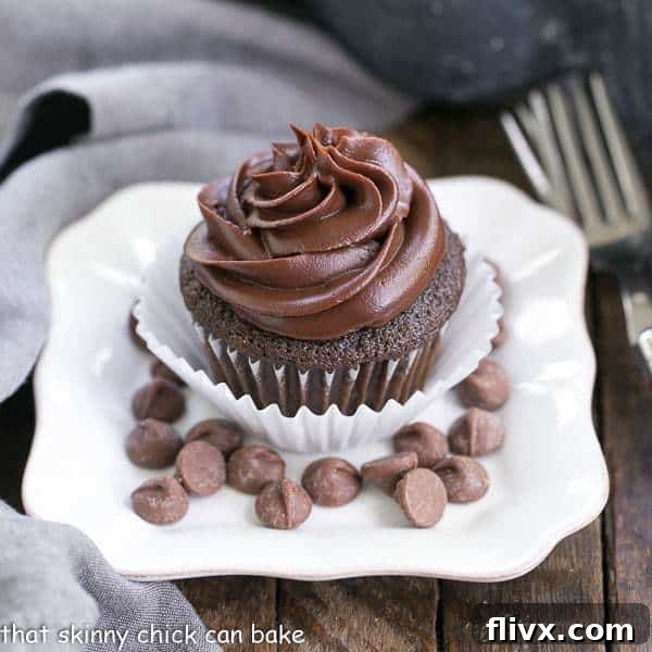 Ghirardelli Dark Chocolate Cupcakes with a luscious chocolate ganache frosting, ready to be enjoyed.