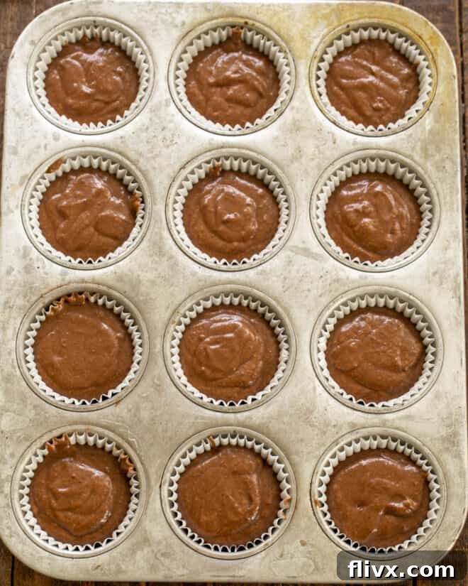 Step 5: Fill cupcake liners ¾ full with batter, bake until done, then allow to cool before frosting with ganache.