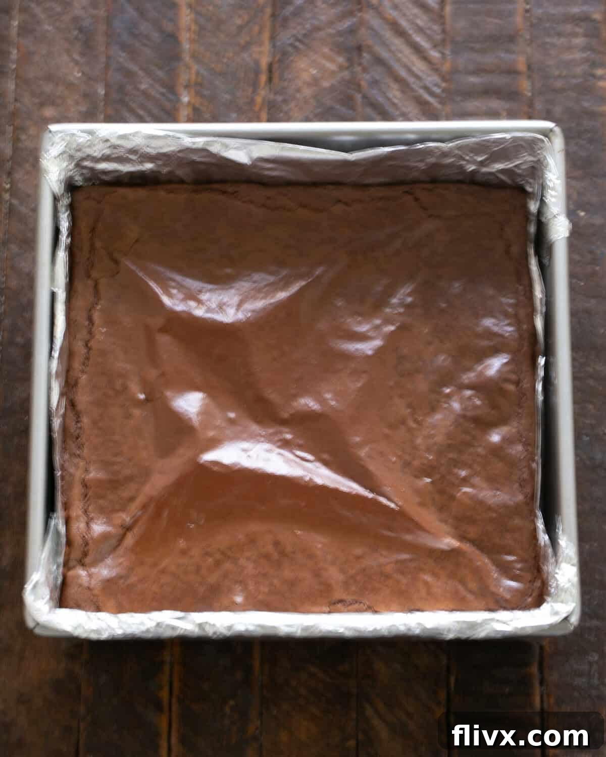 David Lebovitz's Decadent Fudgy Brownies 10 Perfectly baked brownies cooling in the pan before slicing.