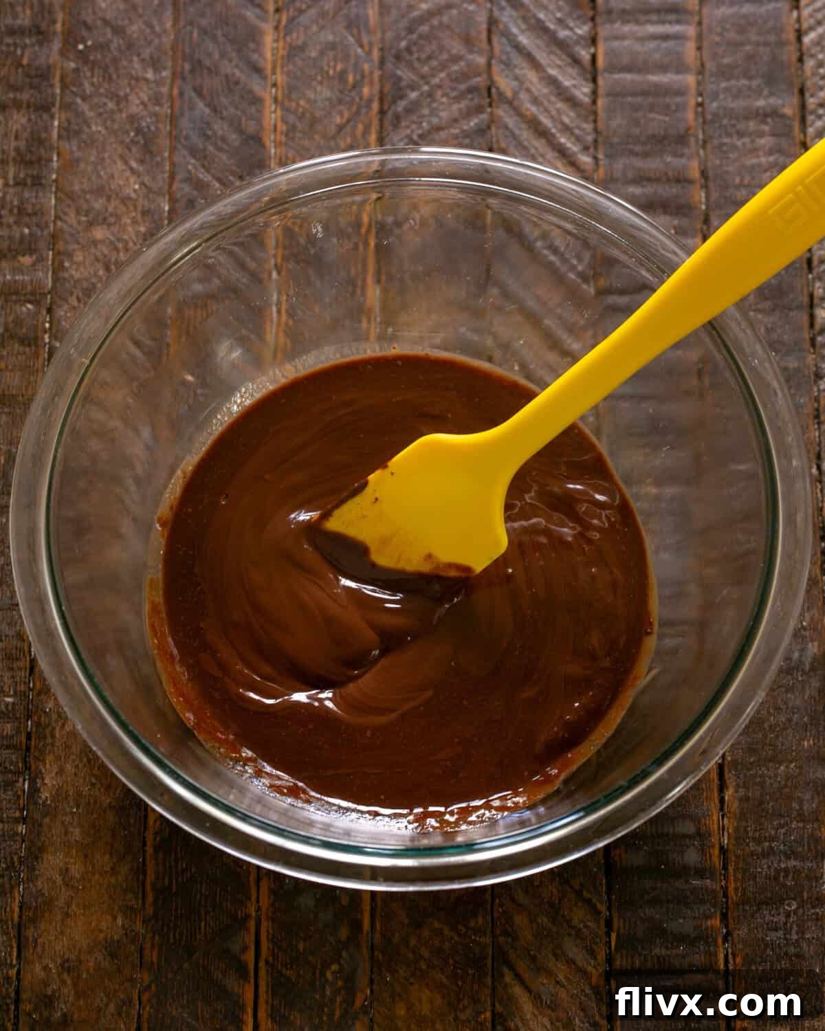 David Lebovitz's Decadent Fudgy Brownies 4 A spatula stirring the melted chocolate and butter until perfectly smooth.