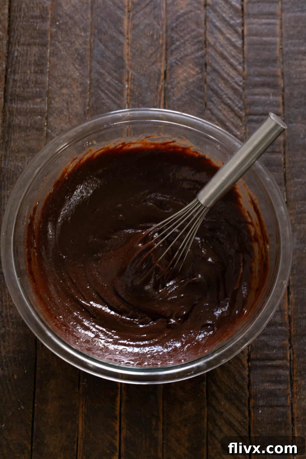 David Lebovitz's Decadent Fudgy Brownies 8 Brownie batter being vigorously whisked for 1 minute until smooth and glossy.