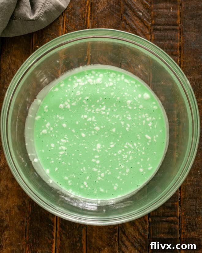 Grasshopper Oreo Freeze 6 Step 3: Combining the ingredients for the filling with a hand mixer.