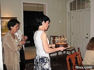 Liz carrying a German Chocolate Cake in 2009.