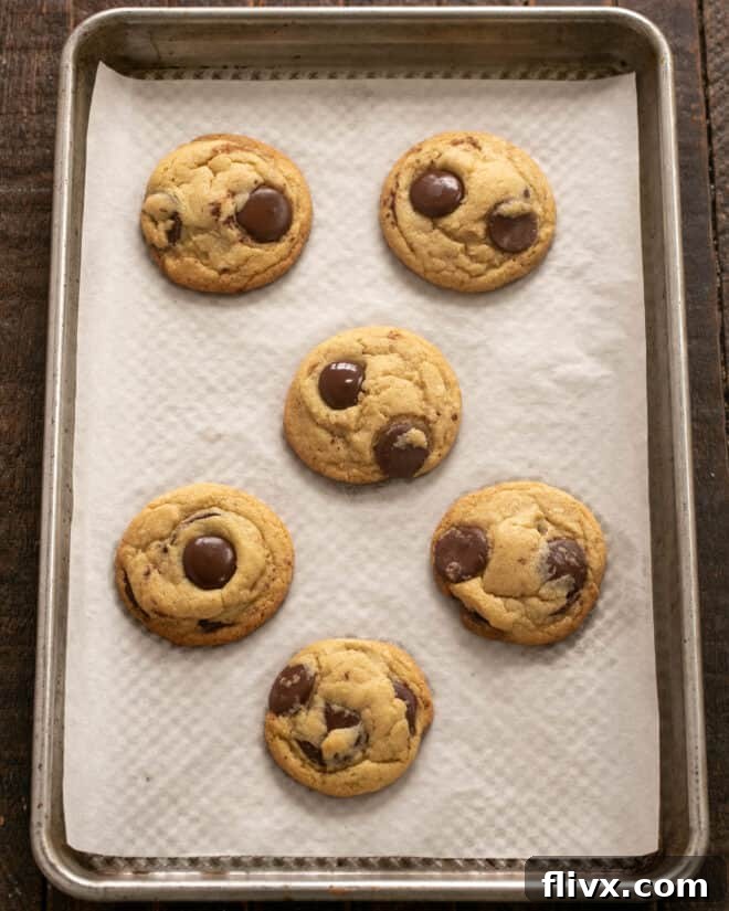 Step 5: Baked Jacques Torres cookies cooling on a wire rack.