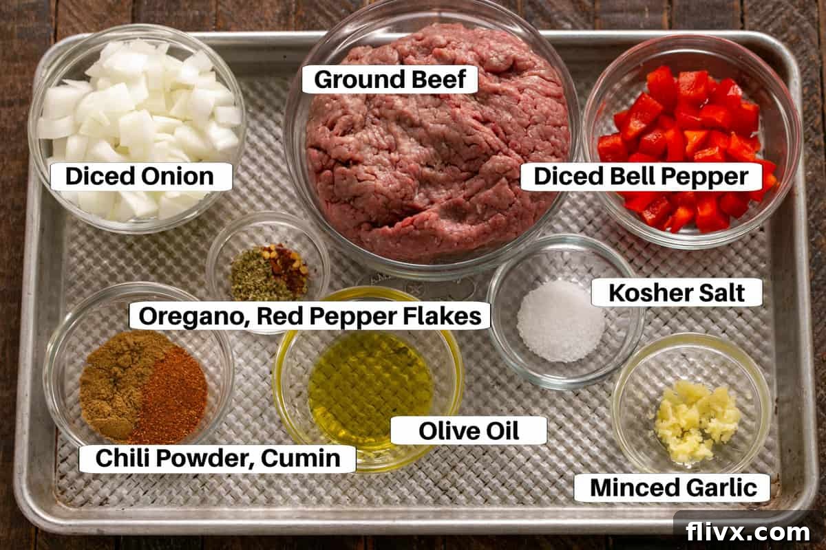 Soft Shell Tacos Ingredients laid out on a sheet pan with labels, showcasing fresh components.