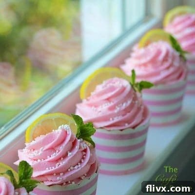 Pink Lemonade Cupcakes lined up on a window sill