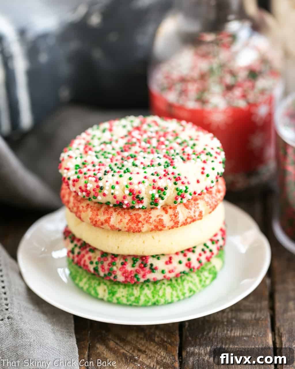Old-Fashioned Amish Sugar Cookies stacked on a white plate, perfect for a cookie exchange.