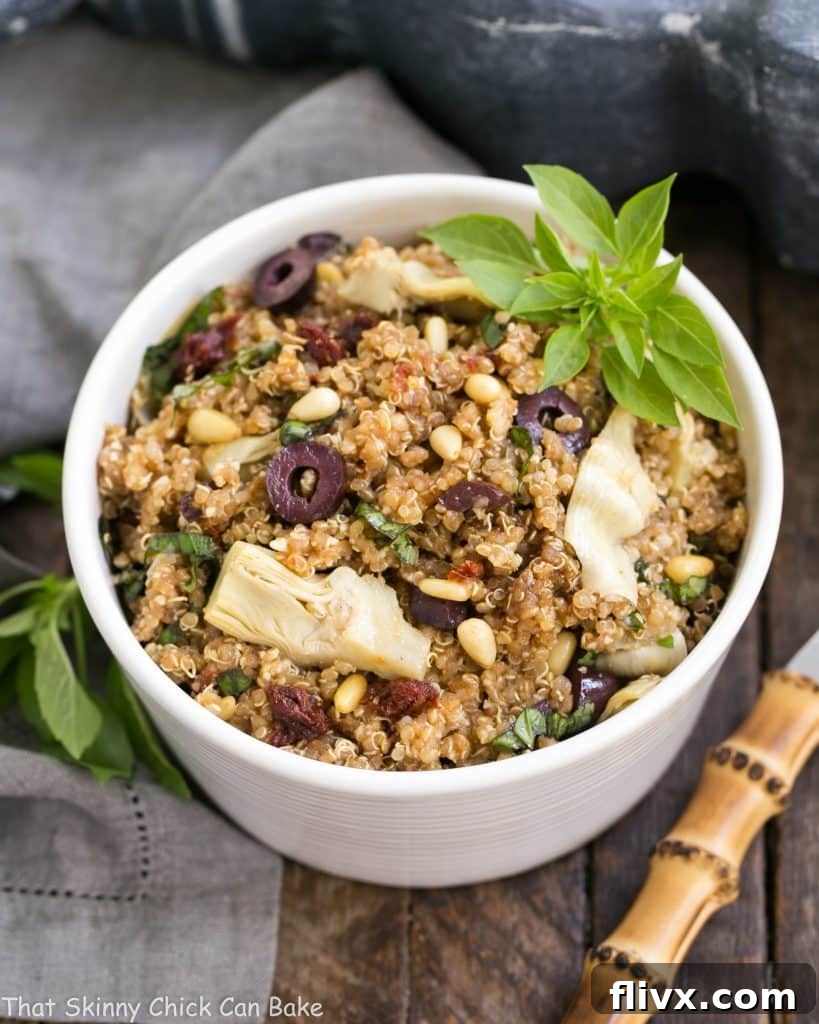 Flavorful Mediterranean Quinoa Salad with Olives, Basil and Sun-dried Tomatoes, perfect for any occasion. Simply dressed with olive oil and balsamic.