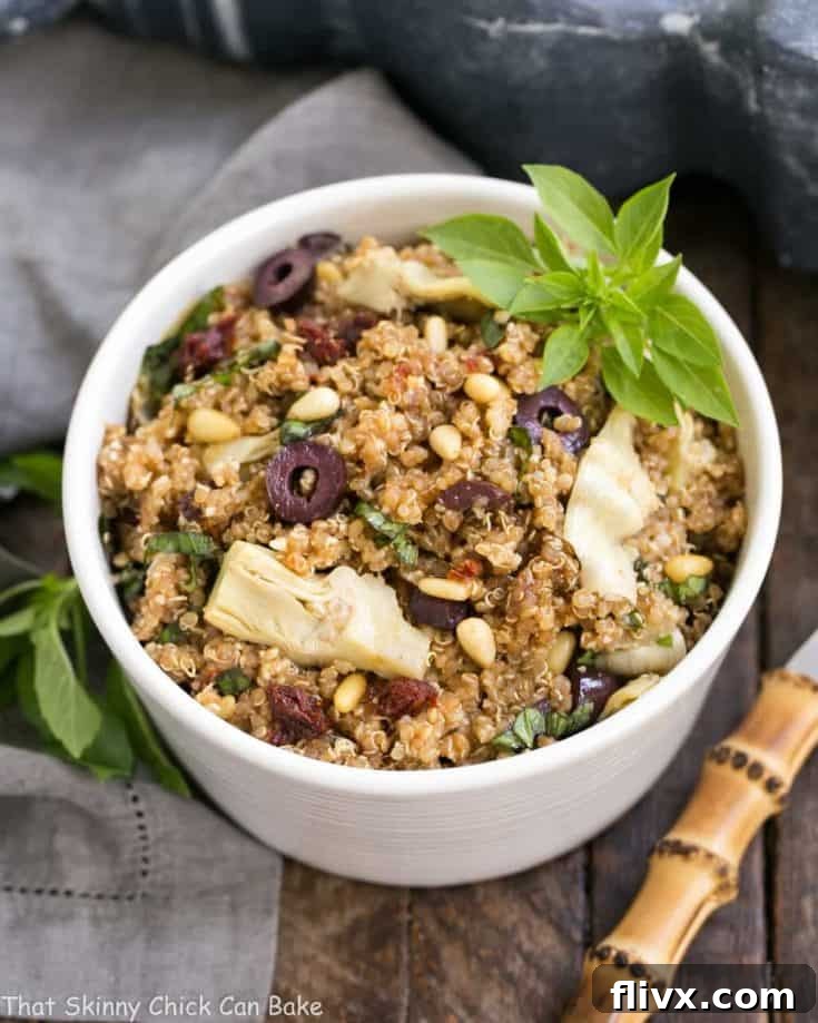 Mediterranean Quinoa Salad with Olives, Basil and Sun-dried Tomatoes - a vibrant, healthy recipe.