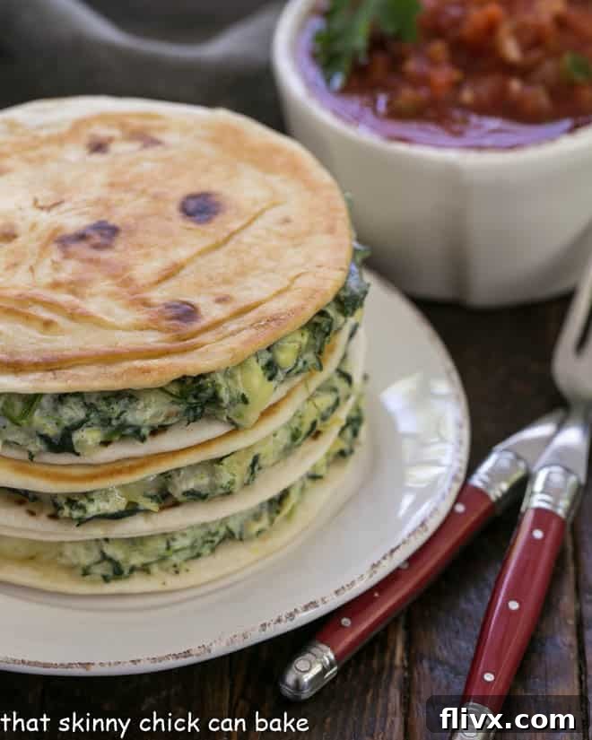A stack of perfectly golden-brown homemade quesadillas on a pristine white plate, accompanied by vibrant red-handled forks and a rustic bowl of chunky salsa, inviting a delicious culinary experience.