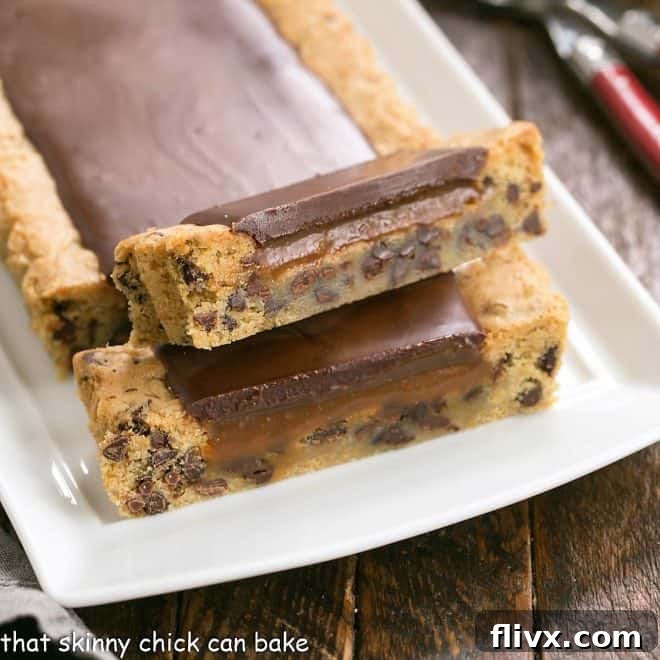 Chocolate chip cookie tart with 2 slices cut and removed from the pan