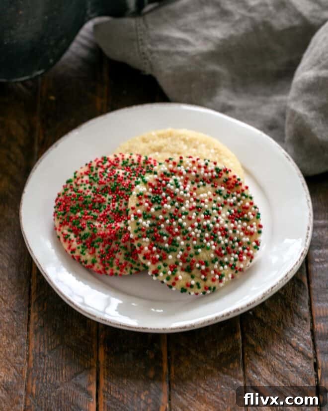 Step 6: Baked giant sugar cookies cooling briefly on the baking sheet before being transferred to a wire rack.