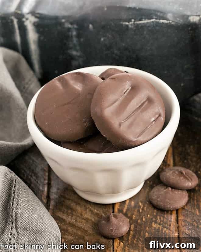 Homemade Peppermint Patties neatly arranged in a small, elegant white bowl.