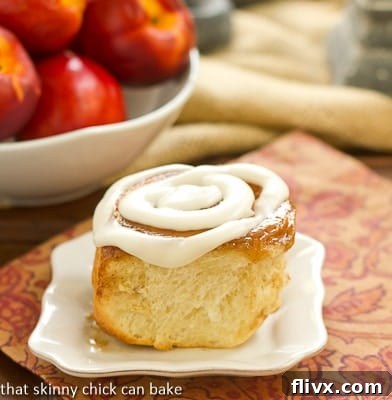 Nectarine cinnamon rolls fresh out of the oven, waiting to be glazed.