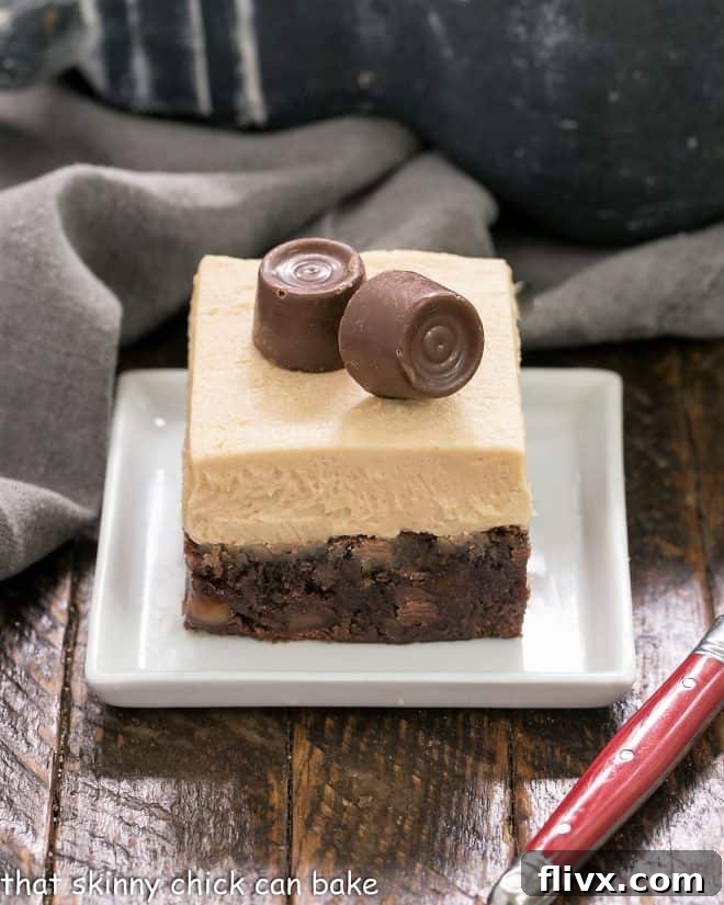A Caramel Brownies with Caramel Buttercream on a white dessert plate